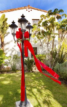 Christmas Lantern Decorations Garden Mission San Buenaventura Ventura California.  Founded 1782 by  Father Junipero Serra.  Named for Saint Bonaventure