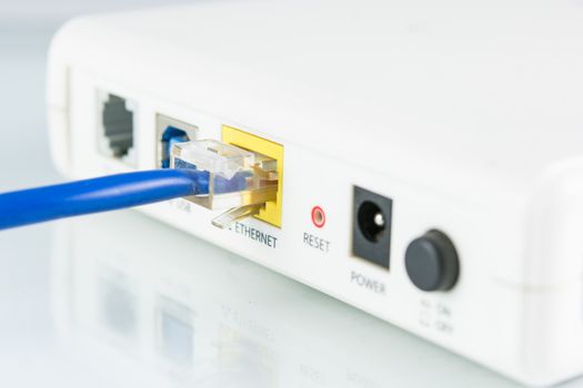 Router network hub with cable insert RJ45 port