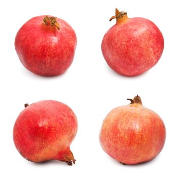 Collection of red pomegranates isolated on white background