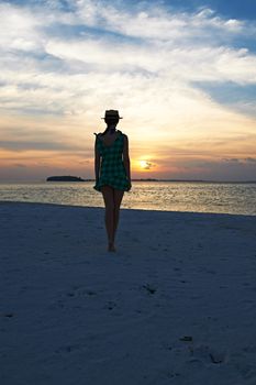 Woman in bikini at tropical beach