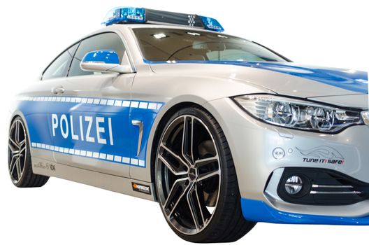 MUNICH, GERMANY - DECEMBER 27, 2013: New model 2014 of German police urban patrol car, presented in BMW welt show. Isolated on white.
