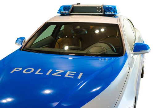 MUNICH, GERMANY - DECEMBER 27, 2013: German police patrol car. New modern BMW model, presented for use in 2014. Isolated on white.