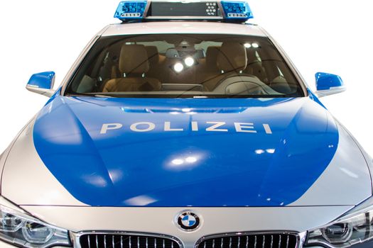 MUNICH, GERMANY - DECEMBER 27, 2013: New modern model of German police duty patrol BMW car. Closeup front view isolated on white.