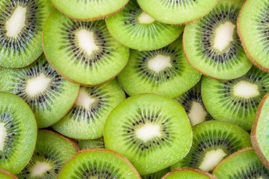 Background of fresh ripe kiwi fruit slices
