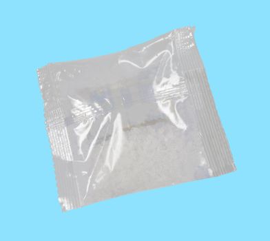 
pharmaceutical package to cool isolated on a blue background 
