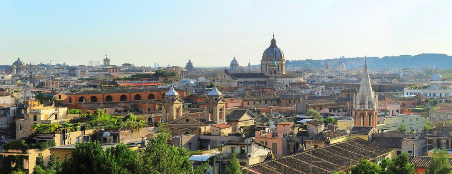 Panoramic colorful view of Rome at sunset. Italy