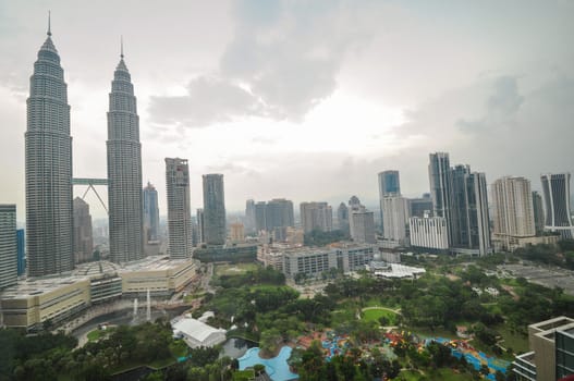 landscape of kuala lumper skyline gardens and petronas towers taken from skybar, Malaysia