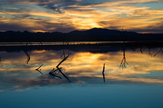 Reflected sun on lake in evening