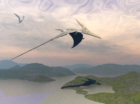 Two pteranodon dinosaurs flying upon landscape with hills and water in cloudy sunset sky