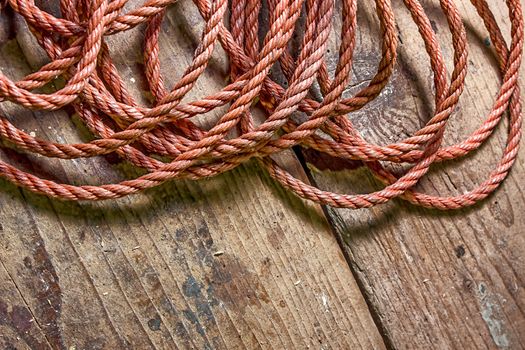 Background of a rope over wood texture