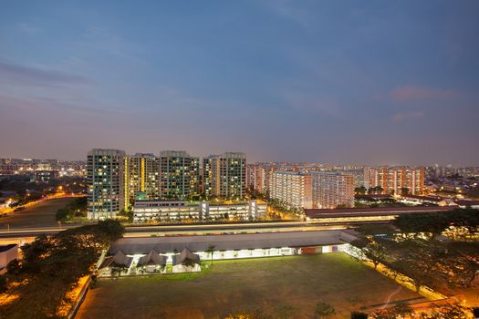 Singapore Housing Estate by MRT Train Station at Dusk