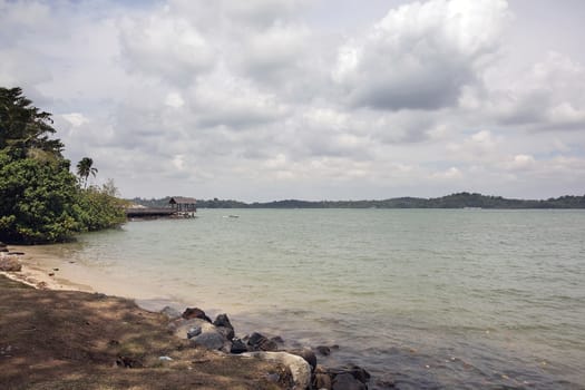 Singapore Changi Point Beach with Pulau Ubin Island on a Cloudy Day