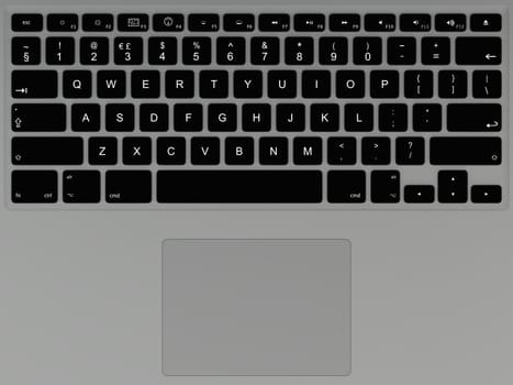 Top view of illuminated keyboard on modern laptop computer