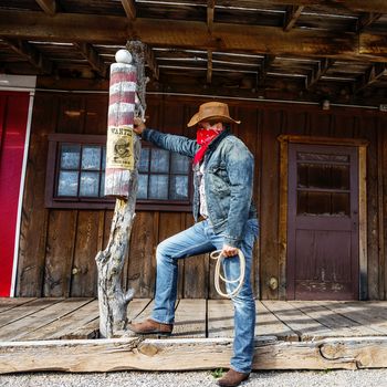 SOUTH WEST - A cowboy takes time to rest and reflect.