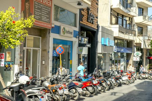 Motorbikes are very popular in Crete because they are easy to park, consume little fuel, and are easy to maneuver in narrow streets of Cretan towns.