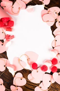 Treats and hearts around a blank Valentines day letter