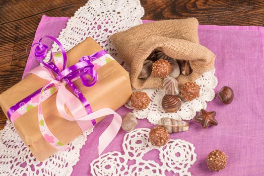 Valentines chocolate treats next to a gift box