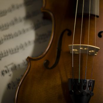 "time to practice violin" violin with sheet music on vintage style