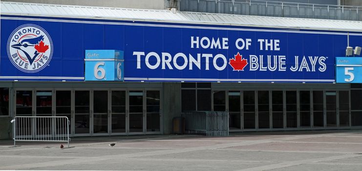 TORONTO - JUL 2: Entrance to the Rogers Centre stadium. Home of the Toronto Blue Jays baseball team. Taken July 2, 2013  in Toronto, Ontario, Canada.
