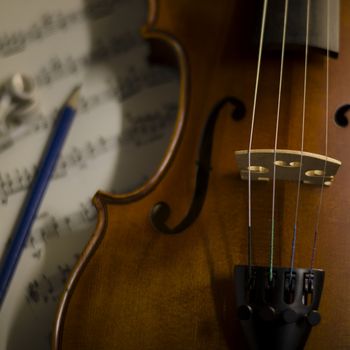 "time to practice violin" violin with sheet music on vintage style