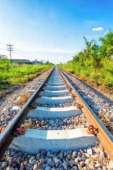 perspective of railway with cloud and sky in thailand evening time