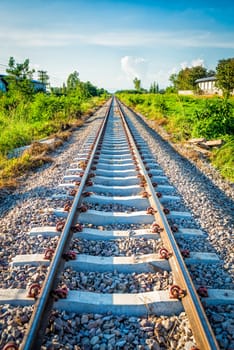 perspective of railway with cloud and sky in thailand evening time