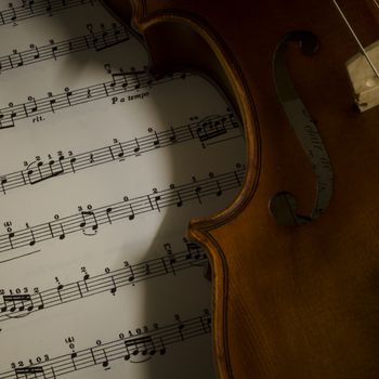 "time to practice violin" violin with sheet music on vintage style