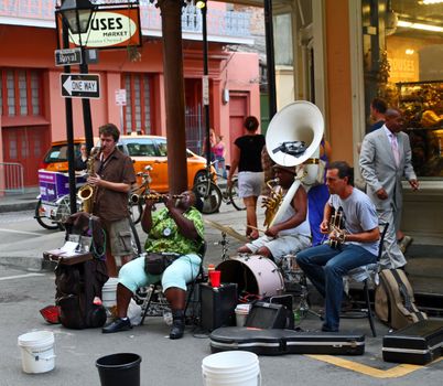 NEW ORLEANS - SEP 07 : A street jazz band plays on Royal Street in the French Quarter of New Orleans. Taken September 07, 2013 in New Orleans, LA.