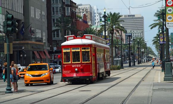 NEW ORLEANS - SEP 9: A cable car going to Harrah's Casino on Canal Street in New Orleans. Taken September 9, 2013  in New Orleans, Louisiana.