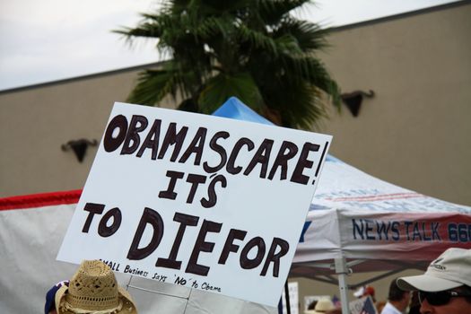 DALLAS - SEP 04 : An Obamacare protest sign at the Tea Party Express conservative political rally in Dallas. Taken September 04, 2009 in Dallas, TX.