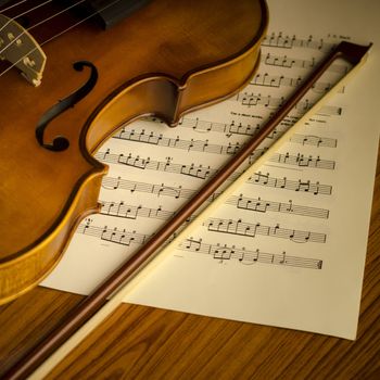 "time to practice violin" violin with sheet music on vintage style