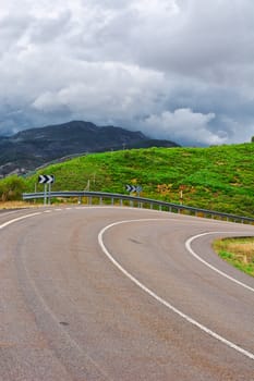 Winding Asphalt Road in the Cantabrian Mountains, Spain