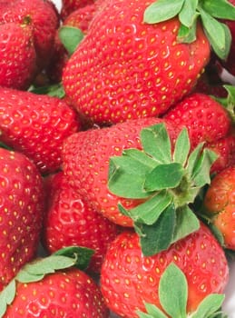 Red sweet strawberries making nice edible background