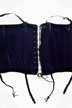 Gothic leather corset on white background