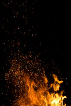 Fire and orange sparks on a black background