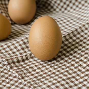 egg in kitchen towel on table