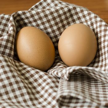 egg in kitchen towel on table