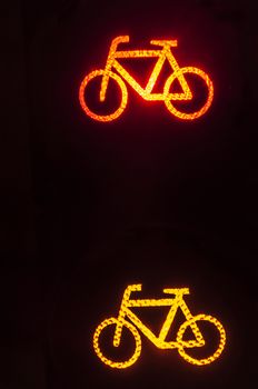 bicycle signs on a traffic light