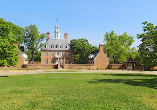 WILLIAMSBURG, VIRGINIA - APRIL 21 2012: The Governors Palace Building in Colonial Williamsburg, Virginia. The building dates from 1722 and was home to seven royal governors of the Virginia colonies.