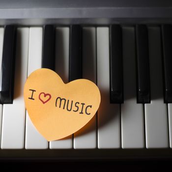 heart on key piano say love music