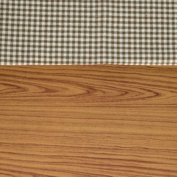 brown kitchen towel pattern on wood background