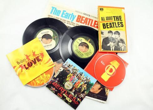 FRISCO, TX - February 8, 2014: Close-up of Beatles LP, singles, CDs and book. The band marks its 50th anniversary appearance on the Ed Sullivan show Sunday, Feb. 9, 2014. They arrived on the American scene in 1964. McCartney and Ringo are the only two surviving members.