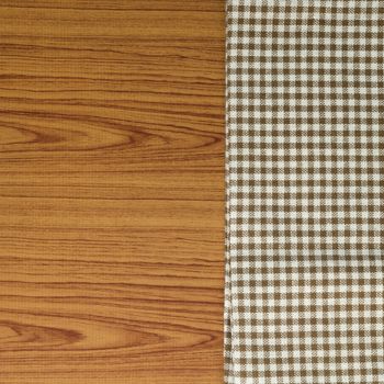 brown kitchen towel pattern on wood background