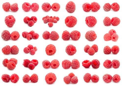 Collection of ripe red raspberries isolated on white background