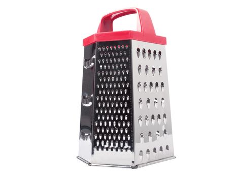 Metal grater with red handle isolated on white background