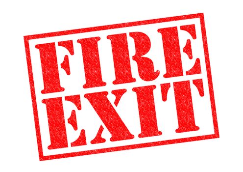 FIRE EXIT red Rubber Stamp over a white background.