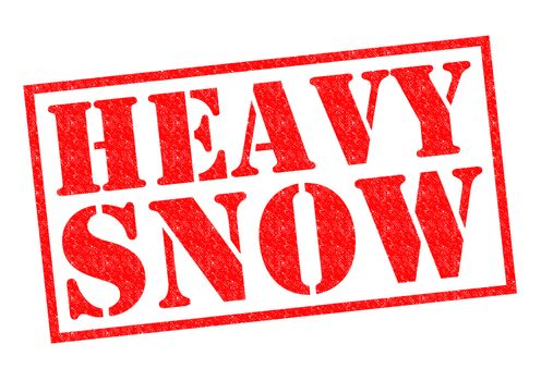 HEAVY SNOW red Rubber Stamp over a white background.