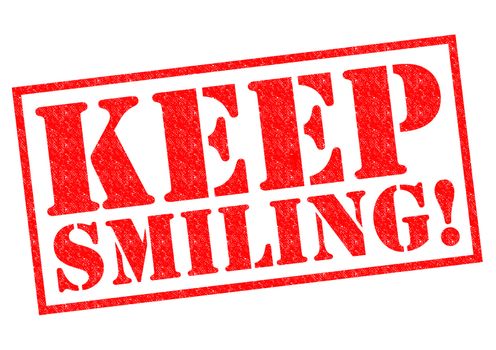 KEEP SMILING! red Rubber Stamp over a white background.