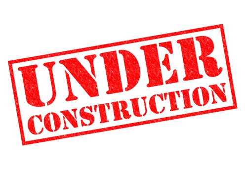 UNDER CONSTRUCTION red Rubber Stamp over a white background.