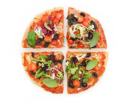 Pizza sliced into quarters over a white white background